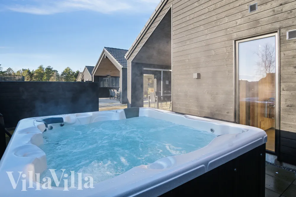 Udendørs spa med damp på Rømø sommerhus
